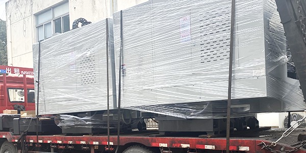 Multiple Taize vertical machining centers are loaded and shipped to the customer's site